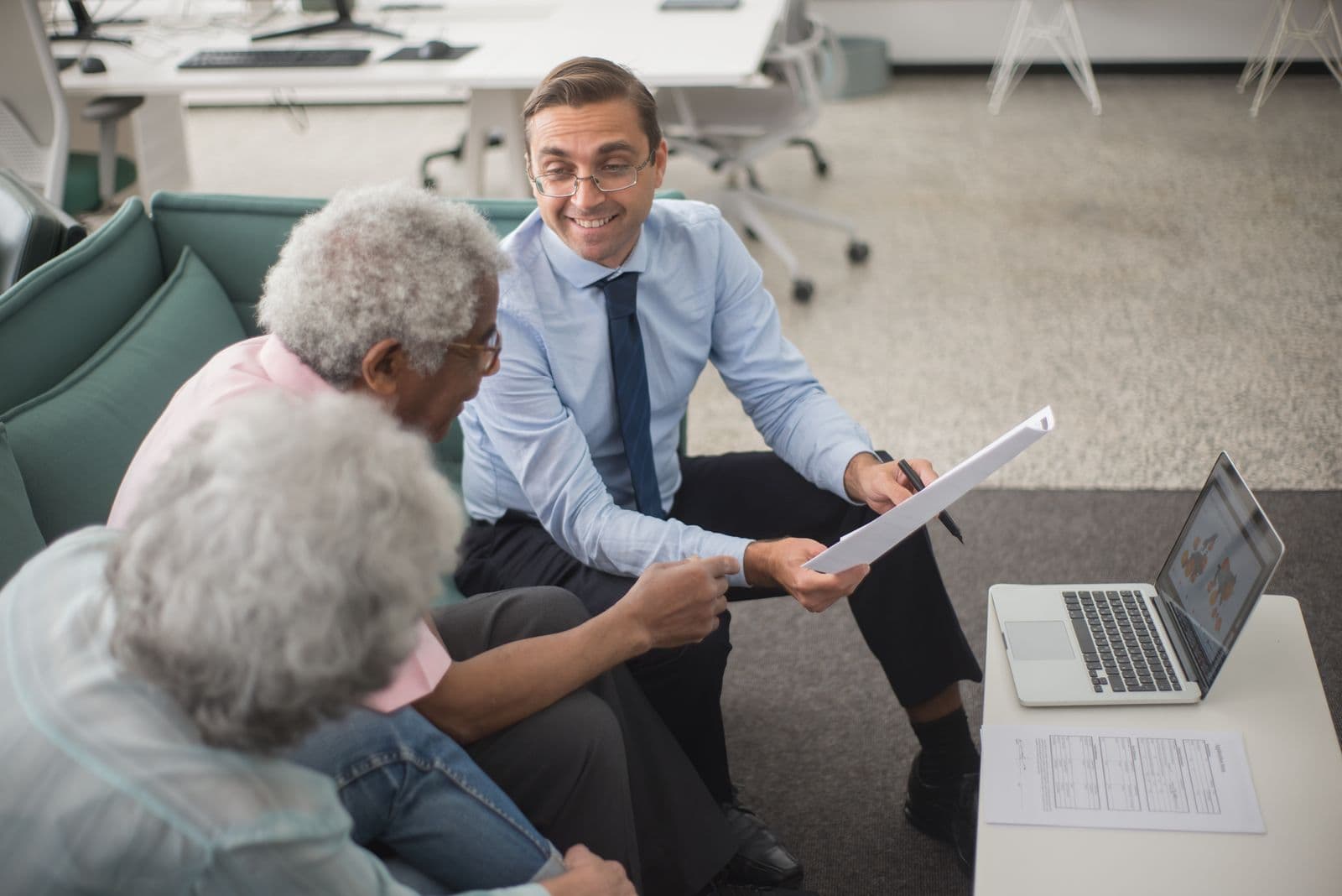 An adviser talking a client through a portfolio
